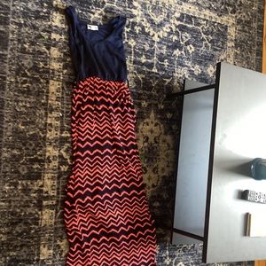 Long dress has belt loops to add belt to dress.